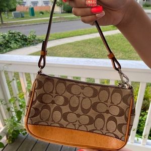 Tan Coach purse